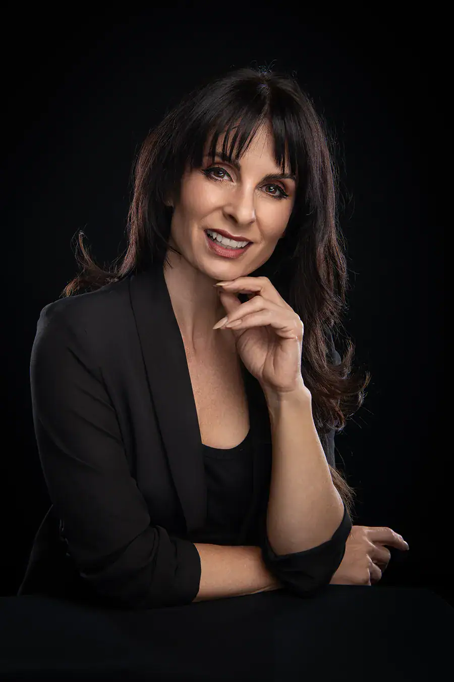 Professional corporate headshot of a woman in a black blazer photographed in Johannesburg