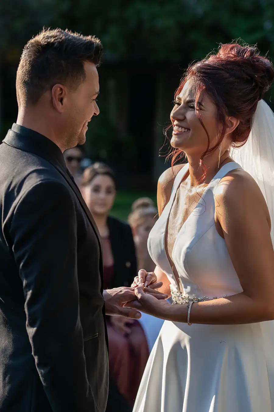 Bride laughing with her groom during their wedding ceremony in Johannesburg