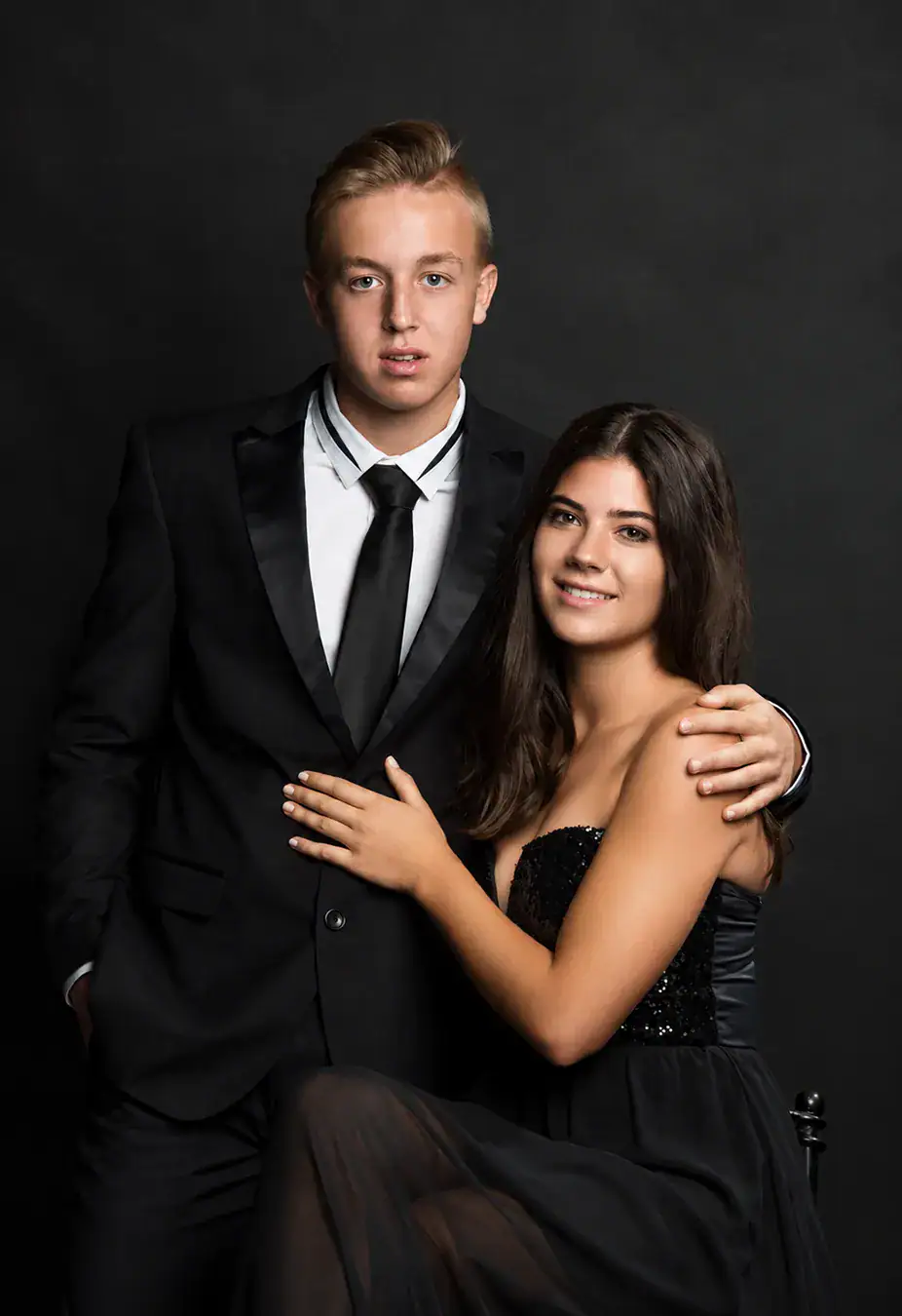 Matric farewell couple in formal evening wear photographed together in a Johannesburg studio