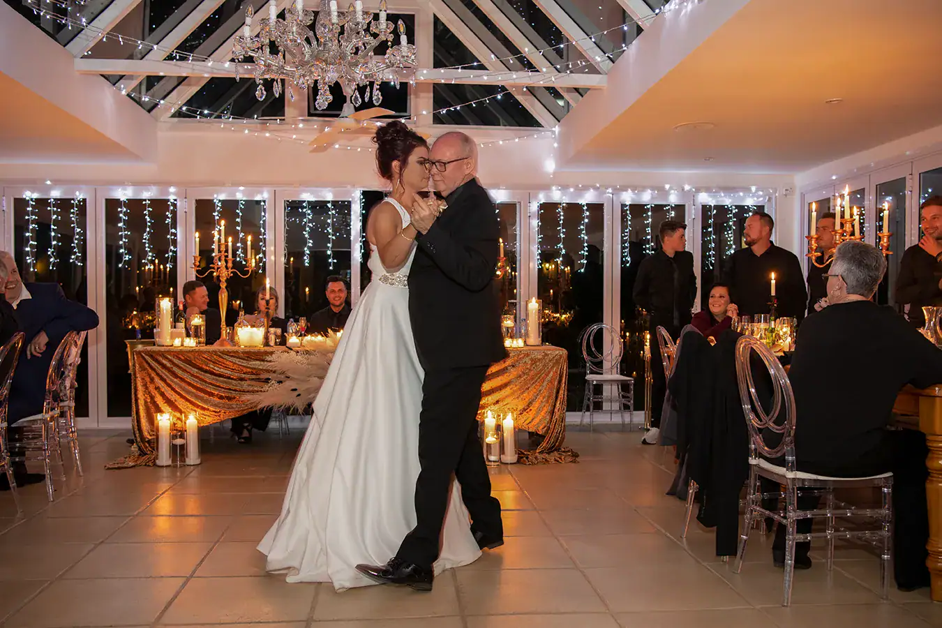 Bride and groom dancing during their wedding reception